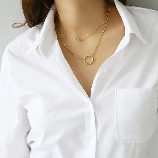 Chemise unie à manches longues en tissu premium